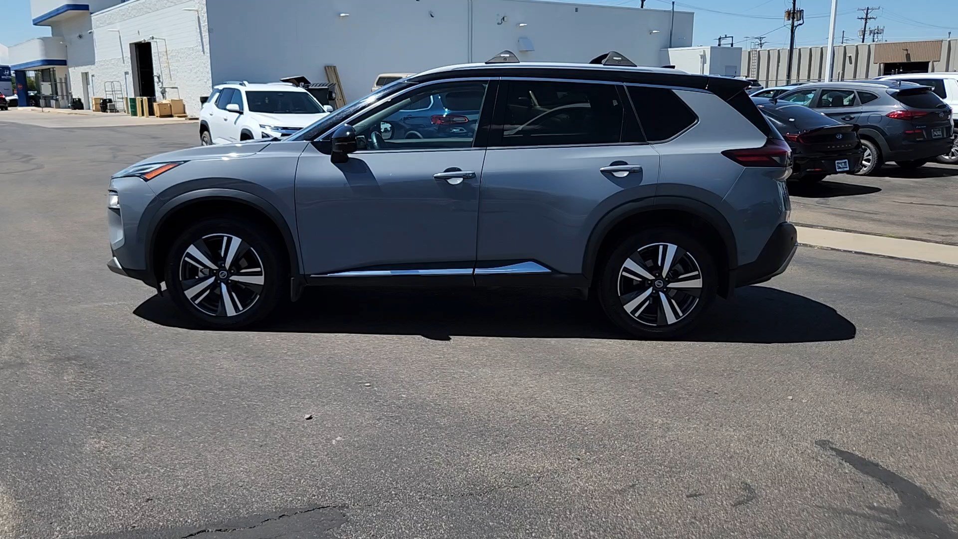 Used 2021 Boulder Gray Pearl/Super Black Nissan Platinum image 2