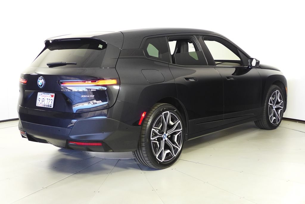 Certified Used 2024 Black Sapphire Metallic BMW xDrive50 image 6