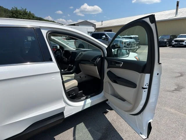 Used 2023 White Metallic Ford Titanium image 72