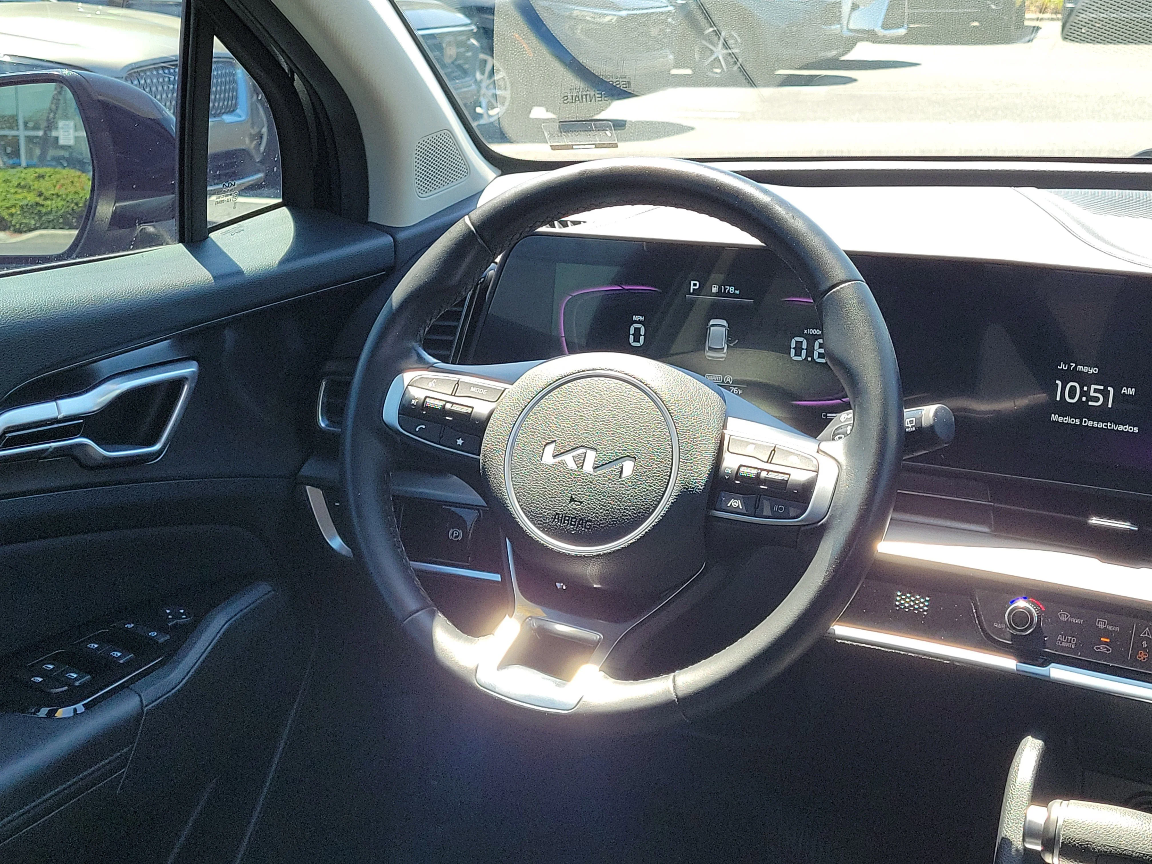 Used 2025 Ebony Black Kia EX image 3