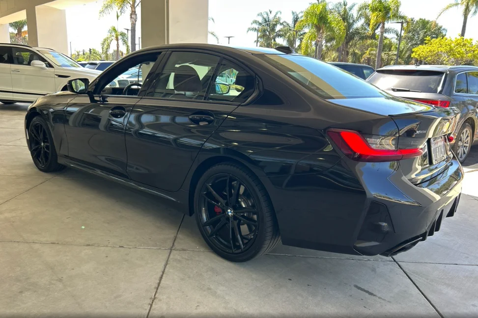 Used 2023 Black BMW M340i xDrive image 2