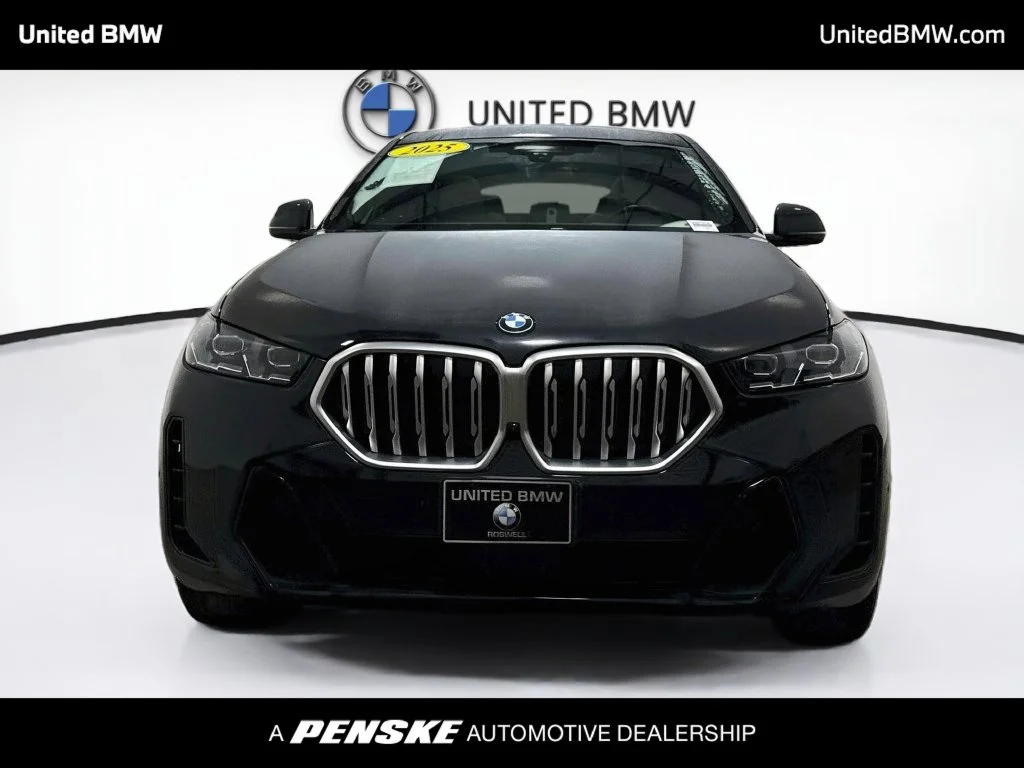Certified Used 2025 Black Sapphire Metallic BMW xDrive40i image 2