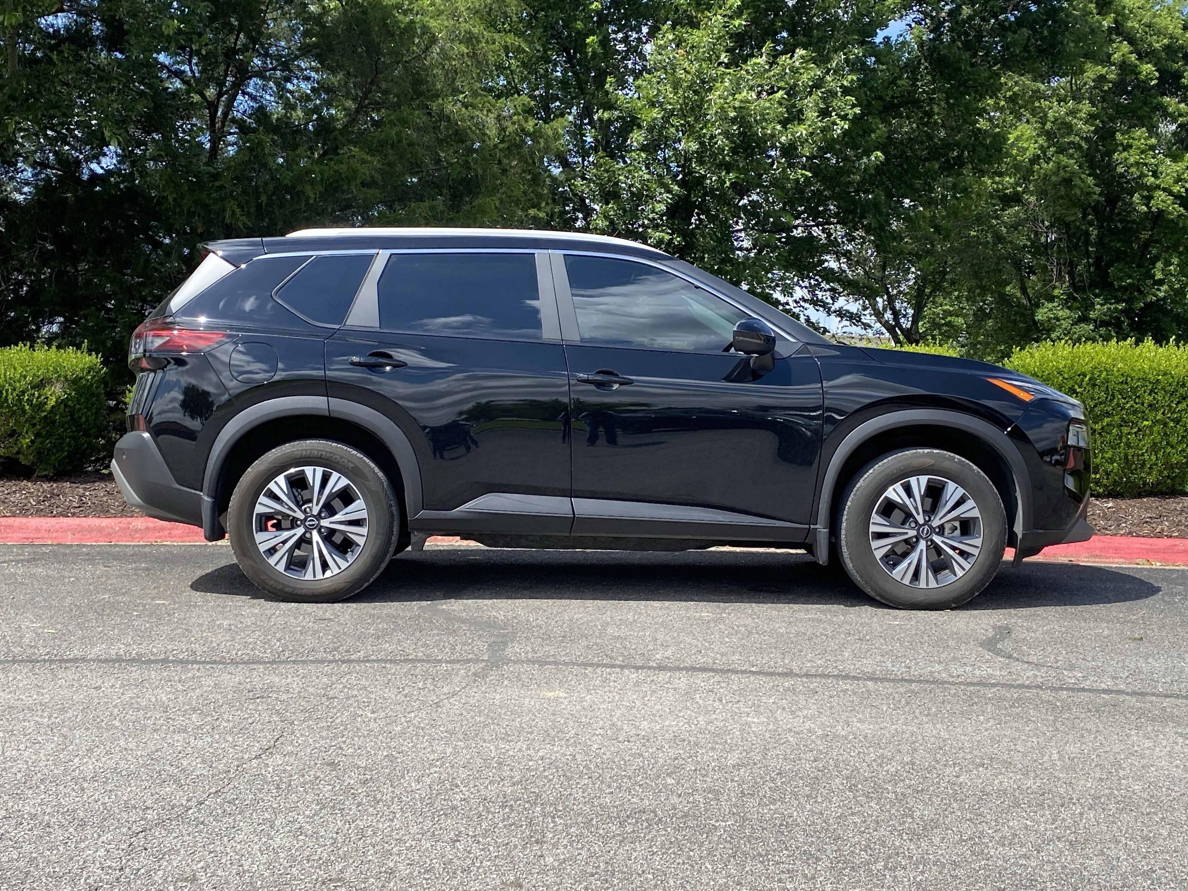 Used 2023 Super Black Nissan SV image 2