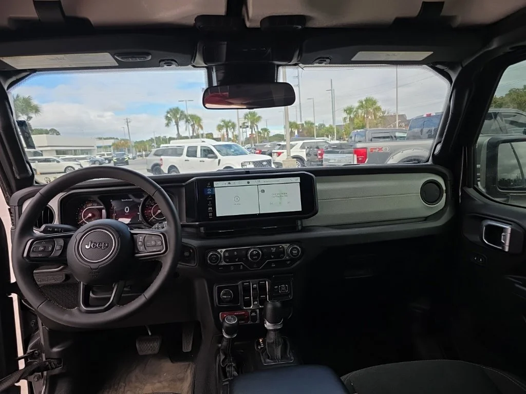 Used 2024 Crystal Metallic Jeep Sport image 11