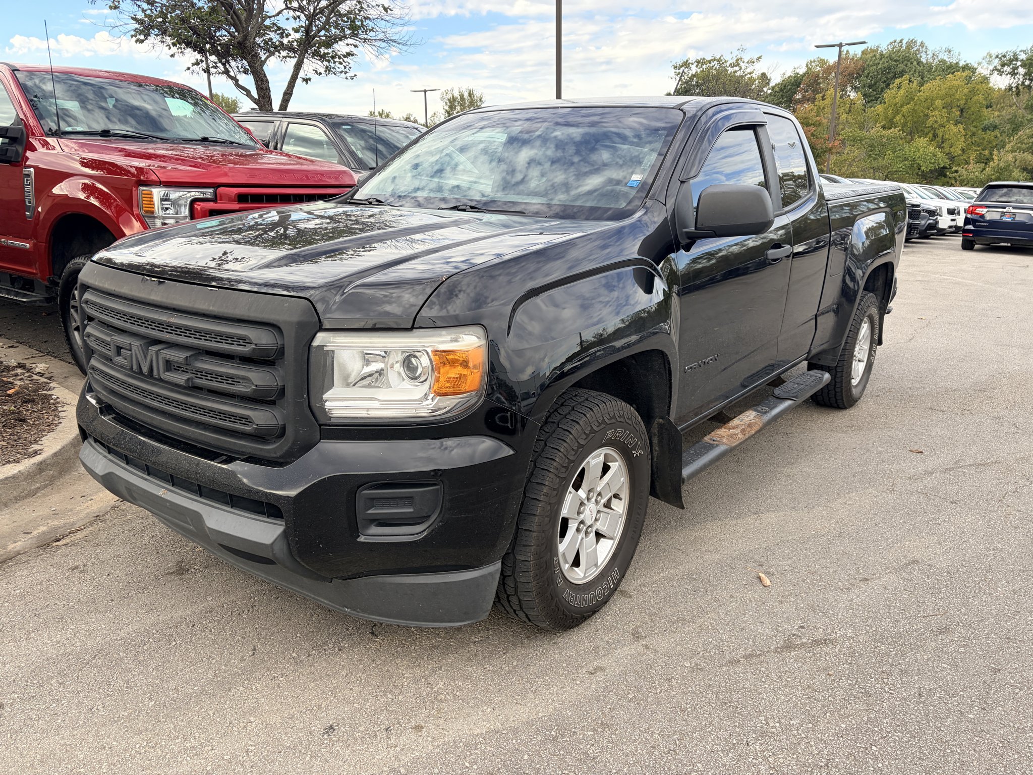 Used 2016 Onyx Black GMC 4WD image 1