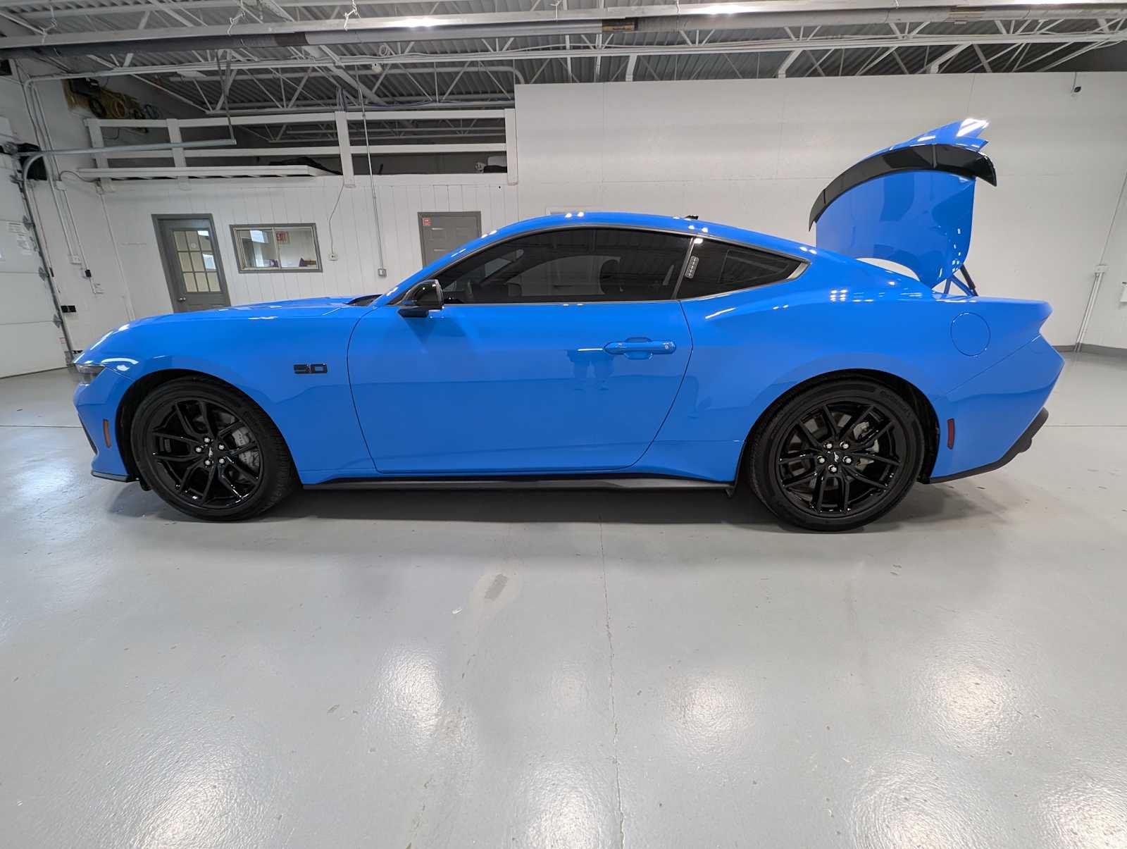 Used 2025 Grabber Blue Ford GT Premium image 12