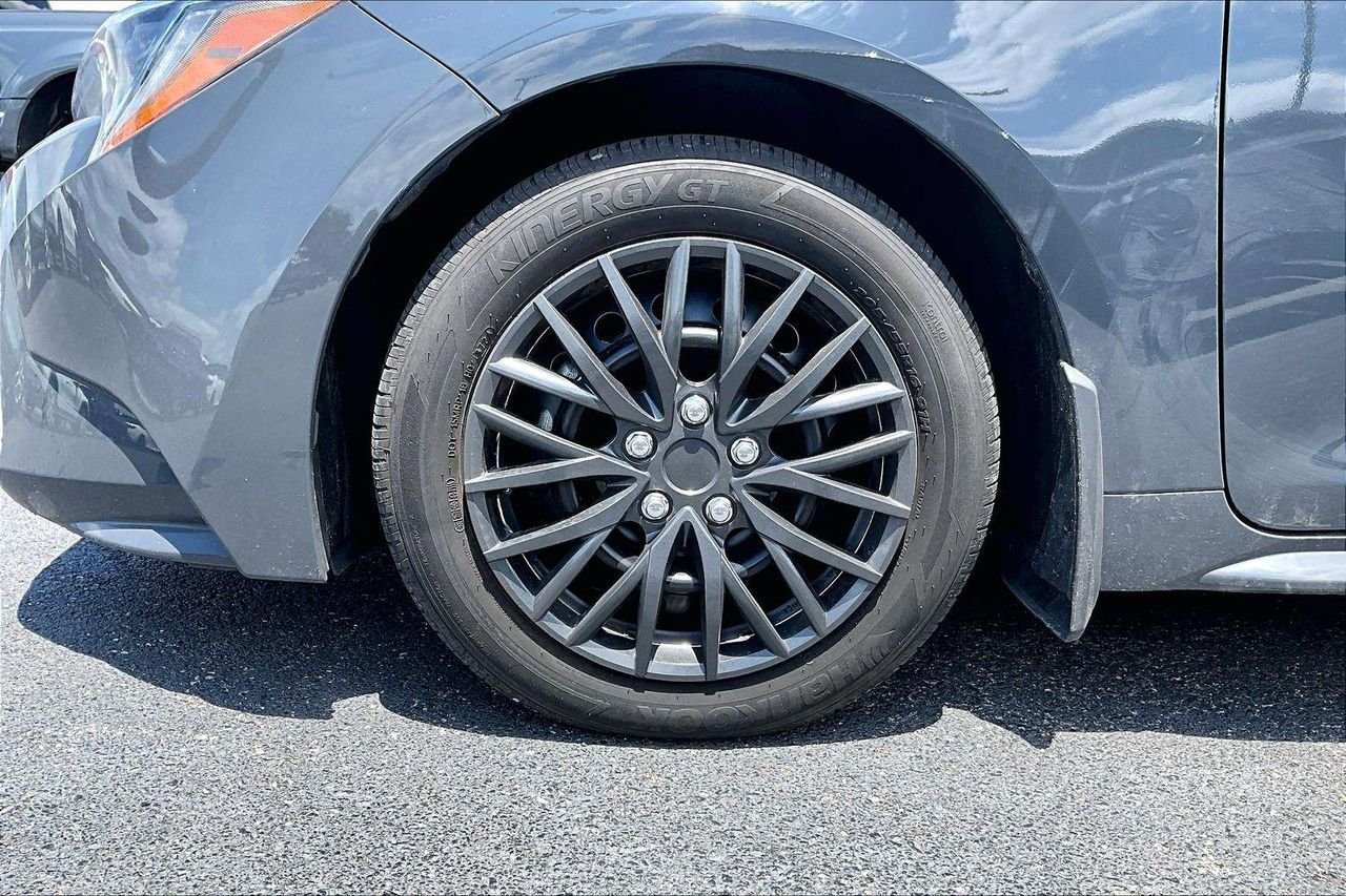Used 2025 Black Toyota LE image 2