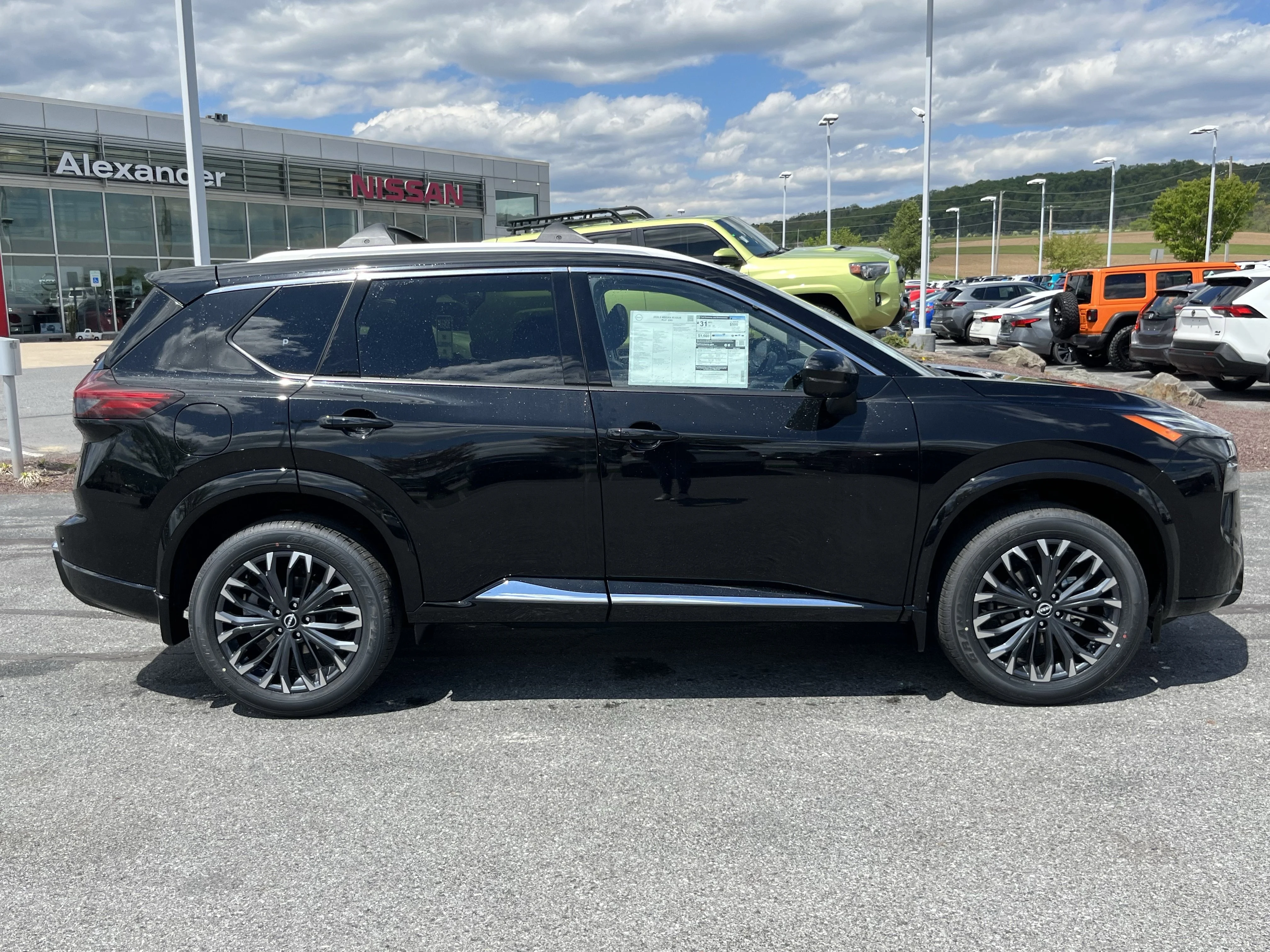 New 2026 Super Black Nissan Platinum image 2