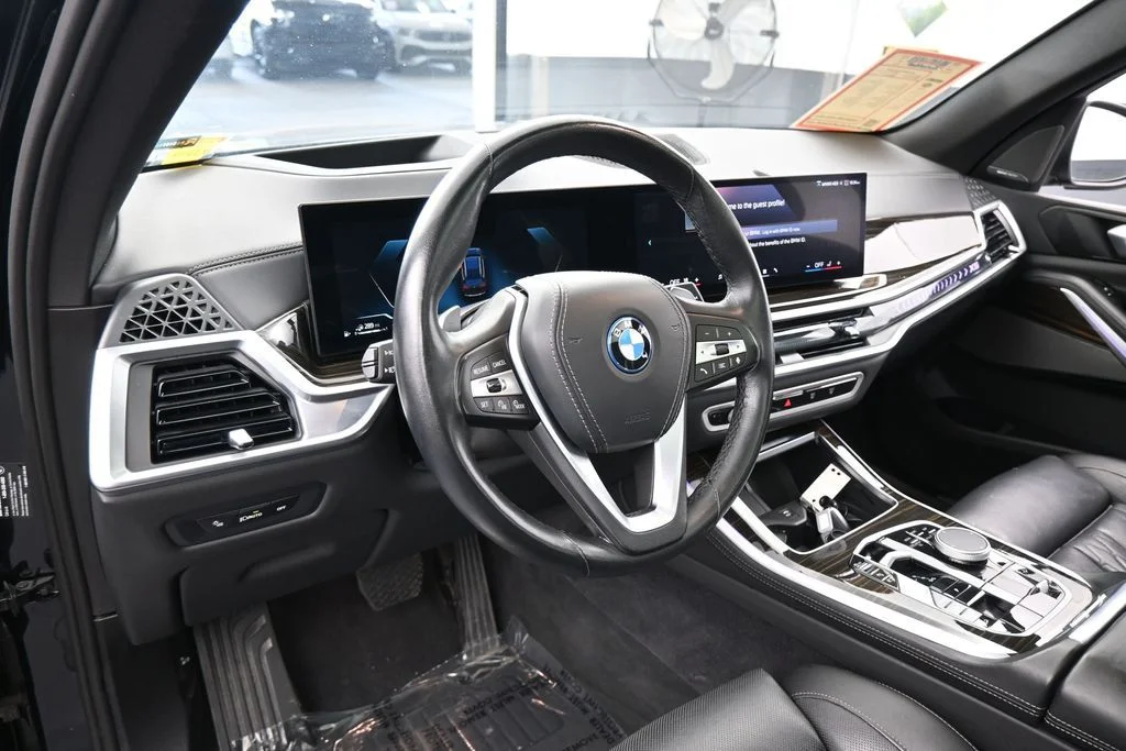 Used 2025 Black Sapphire Metallic BMW xDrive50e image 12