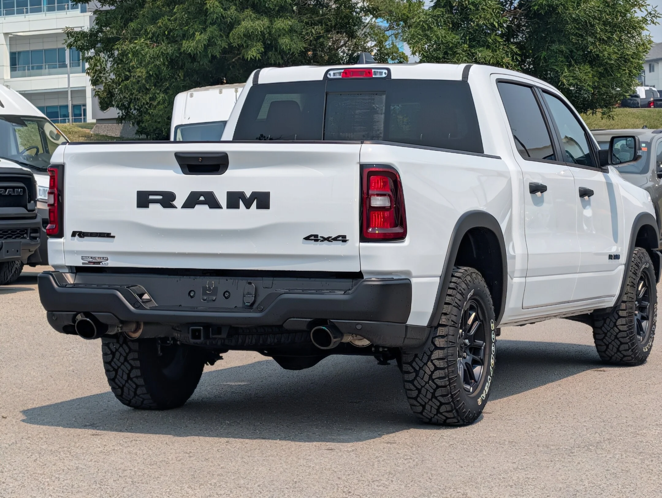 New 2026 White RAM Rebel - - Level 1 Grp - 2LEVEL- A/T TIRES/RIMS- SIDE STEPS AND MORE image 8
