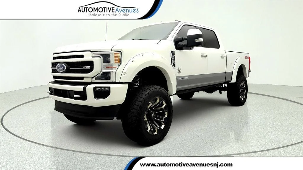 Used 2022 Star White Metallic Tri-Coat Ford Black Widow LARIAT 4WD Crew Cab 6.75