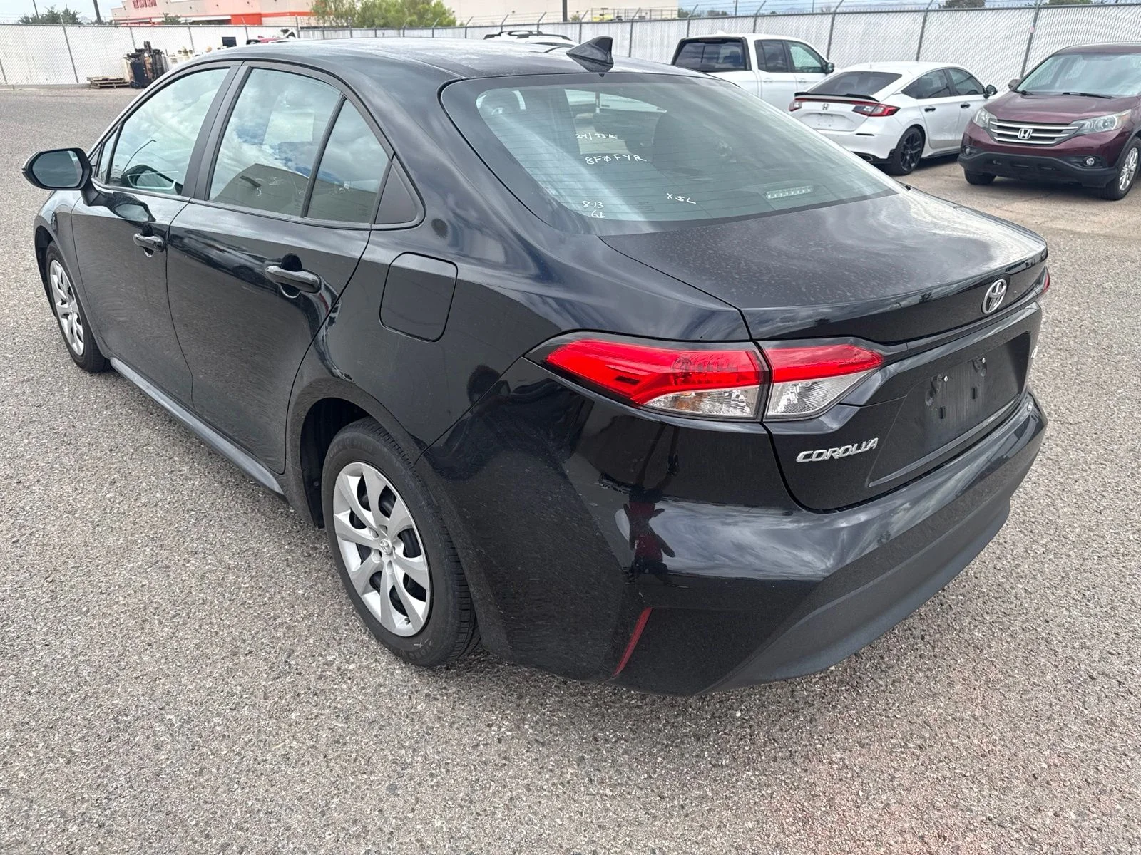Used 2024 Black Toyota LE image 3