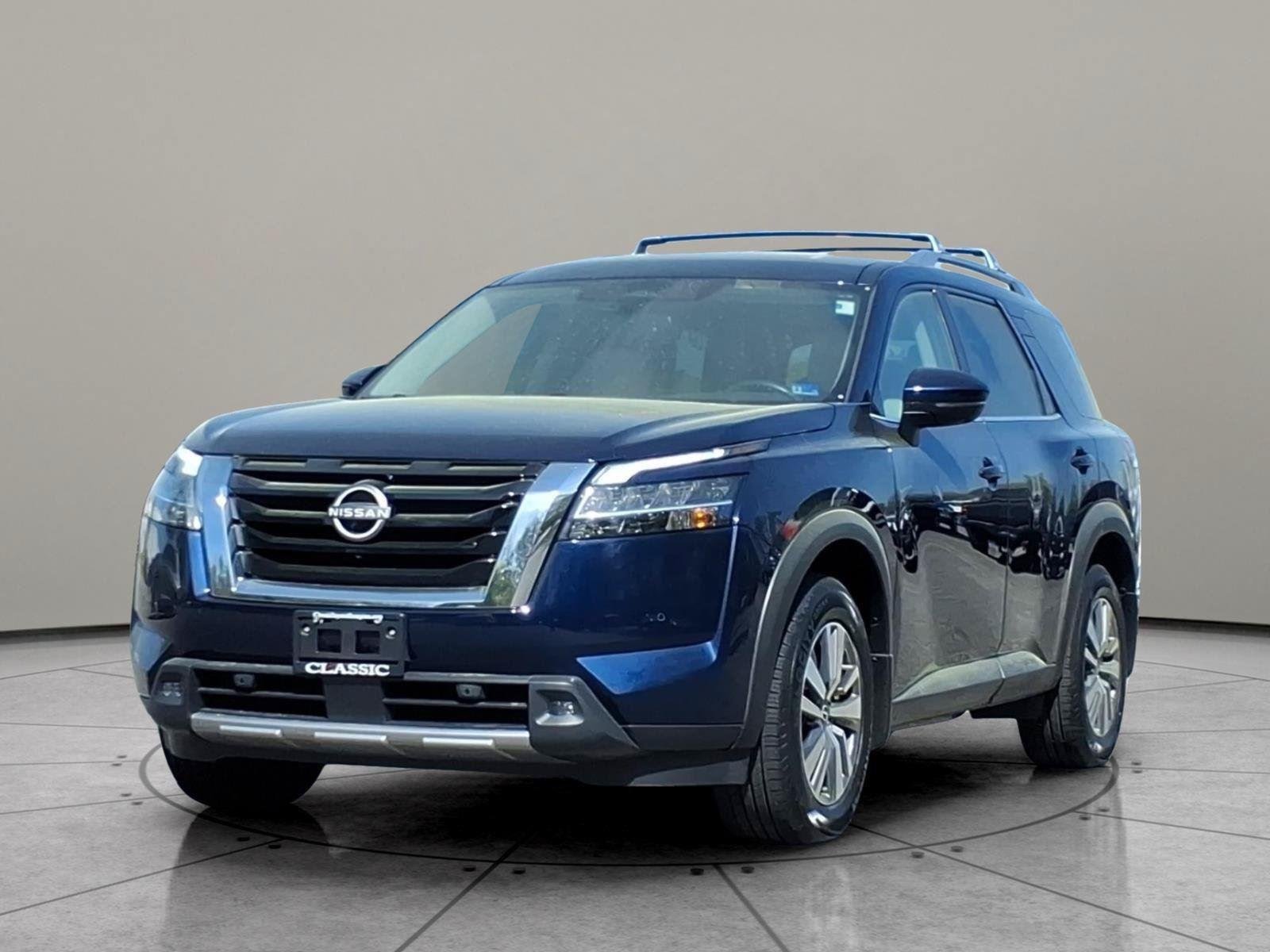 Used 2022 Deep Ocean Blue Pearl Nissan SL image 1