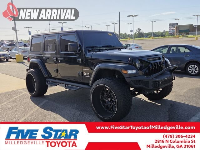 Used 2020 Black Jeep Unlimited Sahara image 1