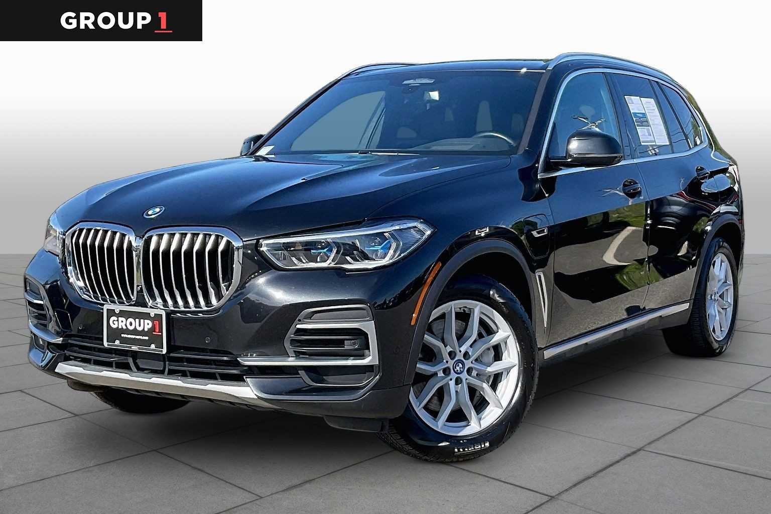Used 2023 Black Sapphire Metallic BMW xDrive45e image 1