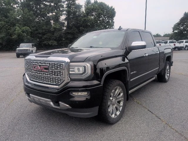 Used 2016 Black GMC Denali image 1