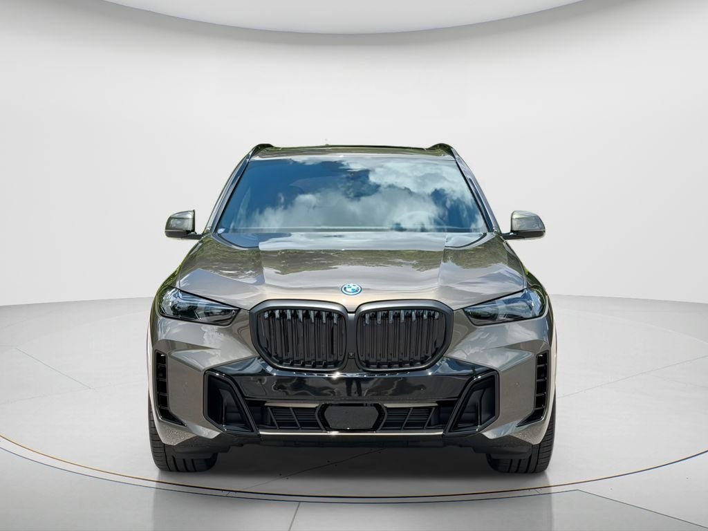 New 2026 Manhattan Green Metallic BMW xDrive50e image 2
