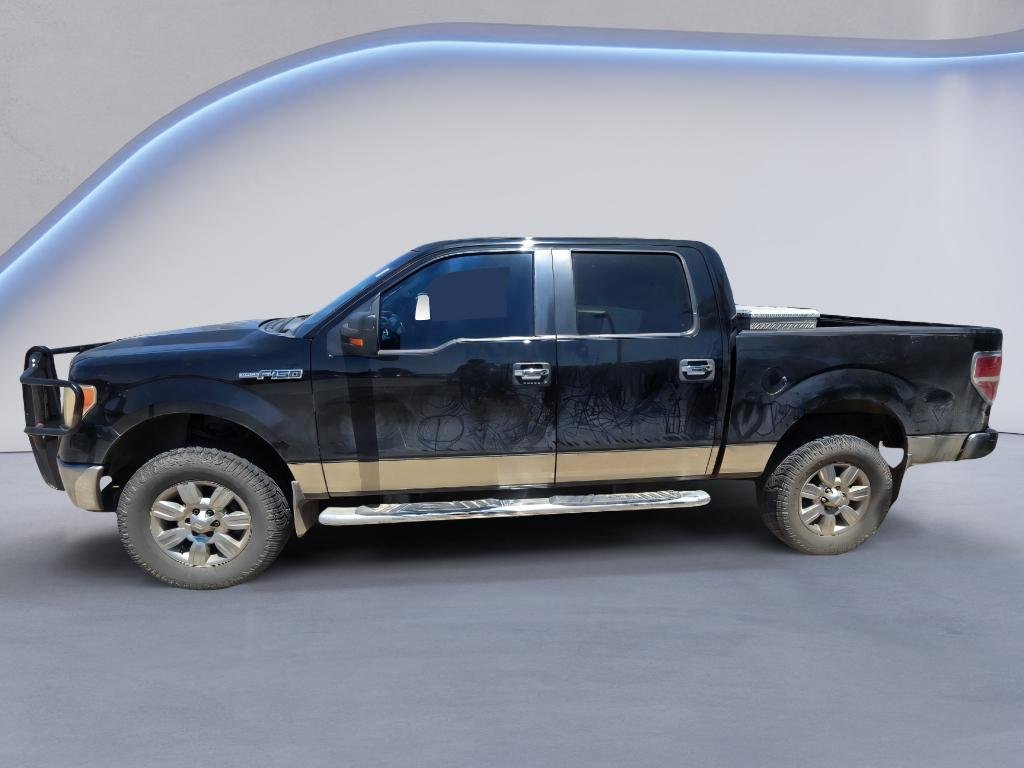 Used 2011 Tuxedo Black Metallic Ford XLT image 2