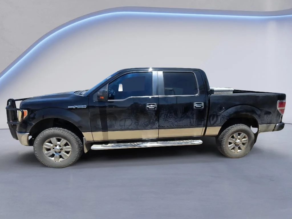 Used 2011 Tuxedo Black Metallic Ford XLT image 2