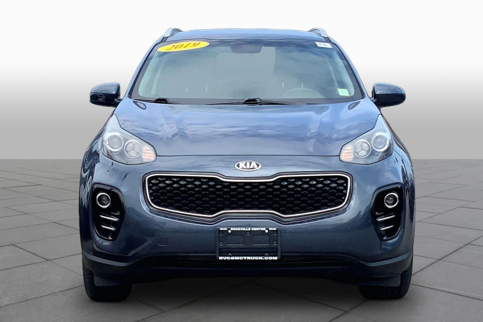 Used 2019 Pacific Blue Kia LX image 4