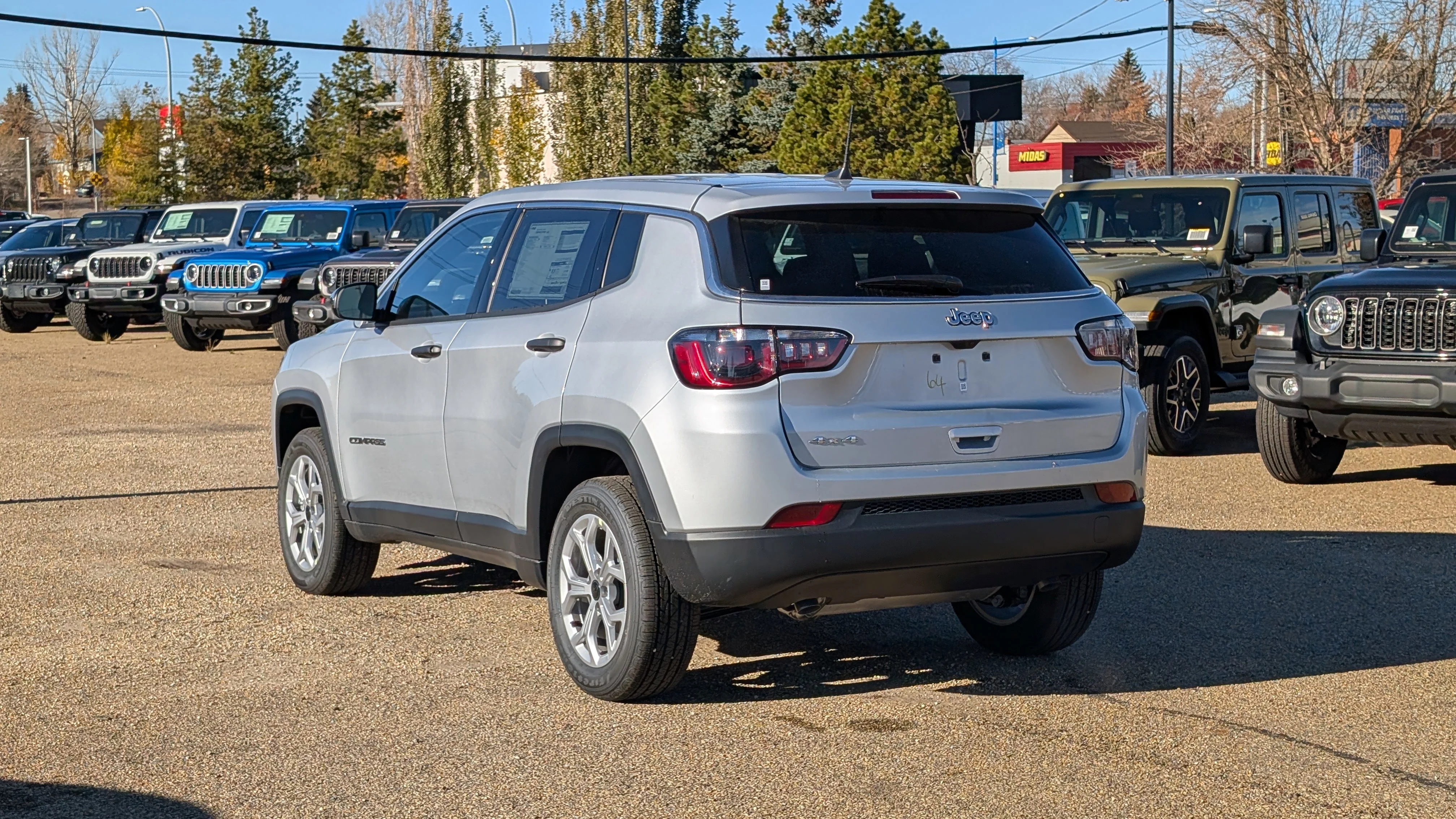 New 2026 Silver Zynith Metallic Jeep Sport image 4