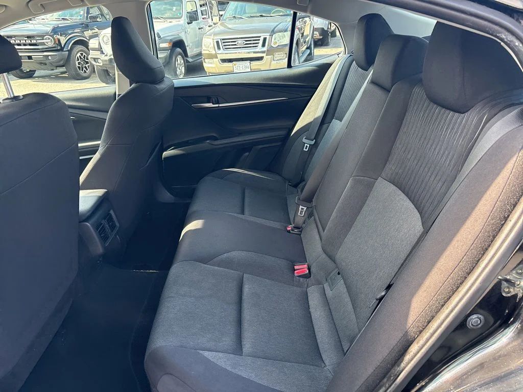 Used 2025 Midnight Black Metallic Toyota LE image 24