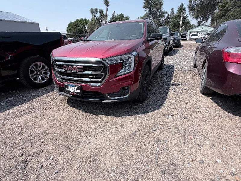 Used 2023 Volcanic Red Tintcoat GMC AT4 image 1