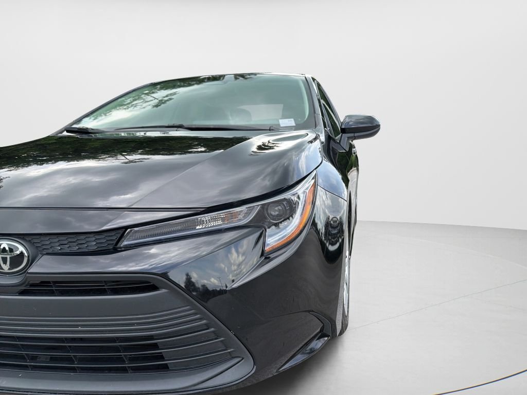 Used 2024 Black Toyota LE image 9