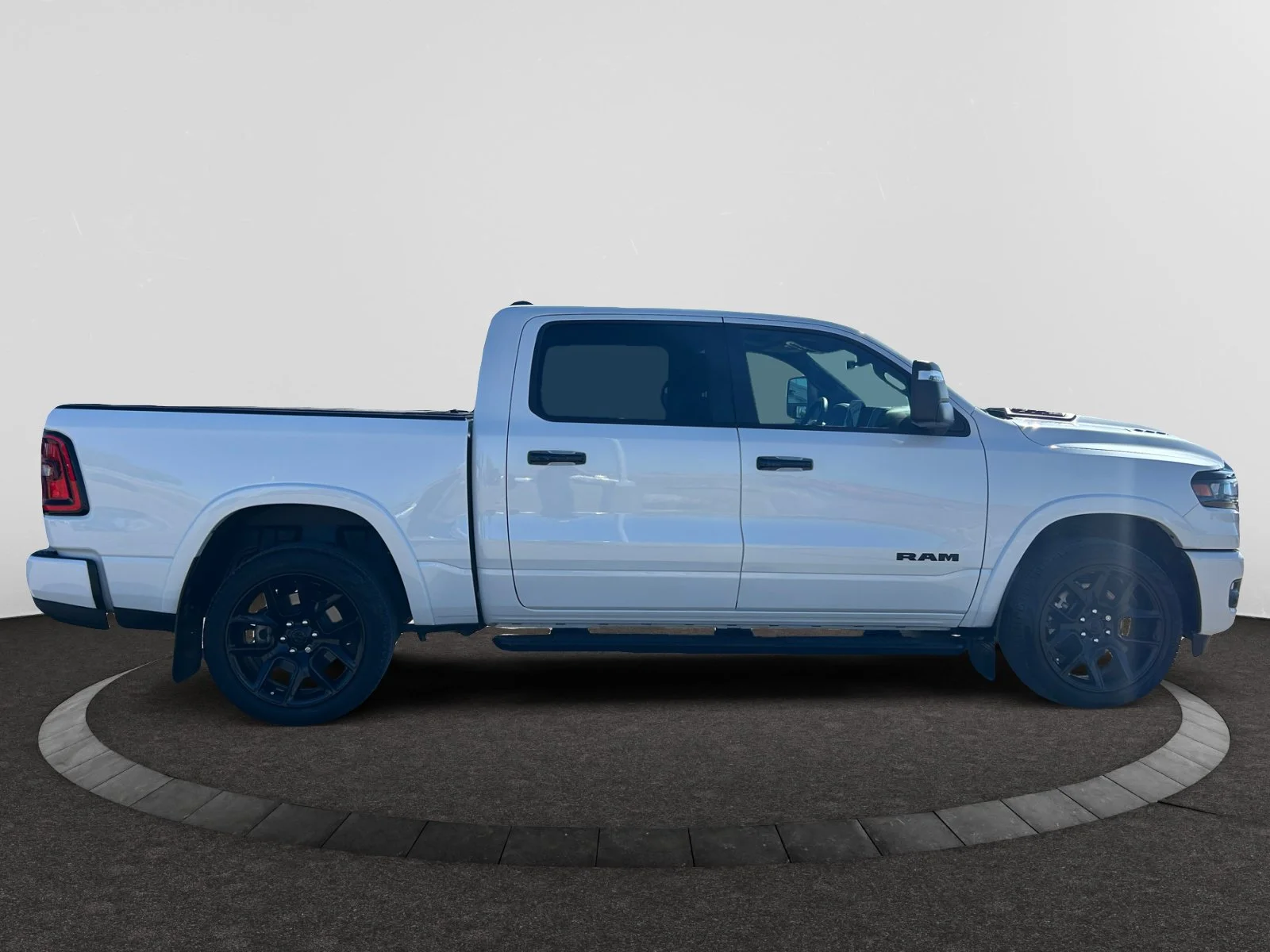 Used 2025 Ivory Tri-Coat Pearl Ram Laramie image 6