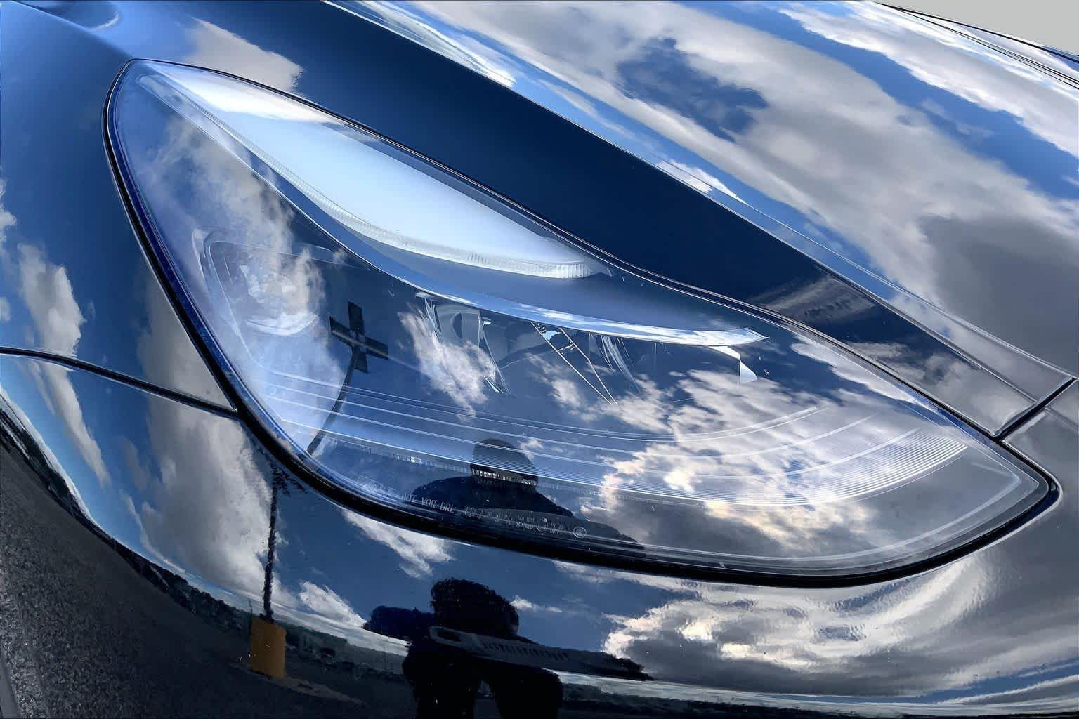 Used 2024 Solid Black Tesla  image 25
