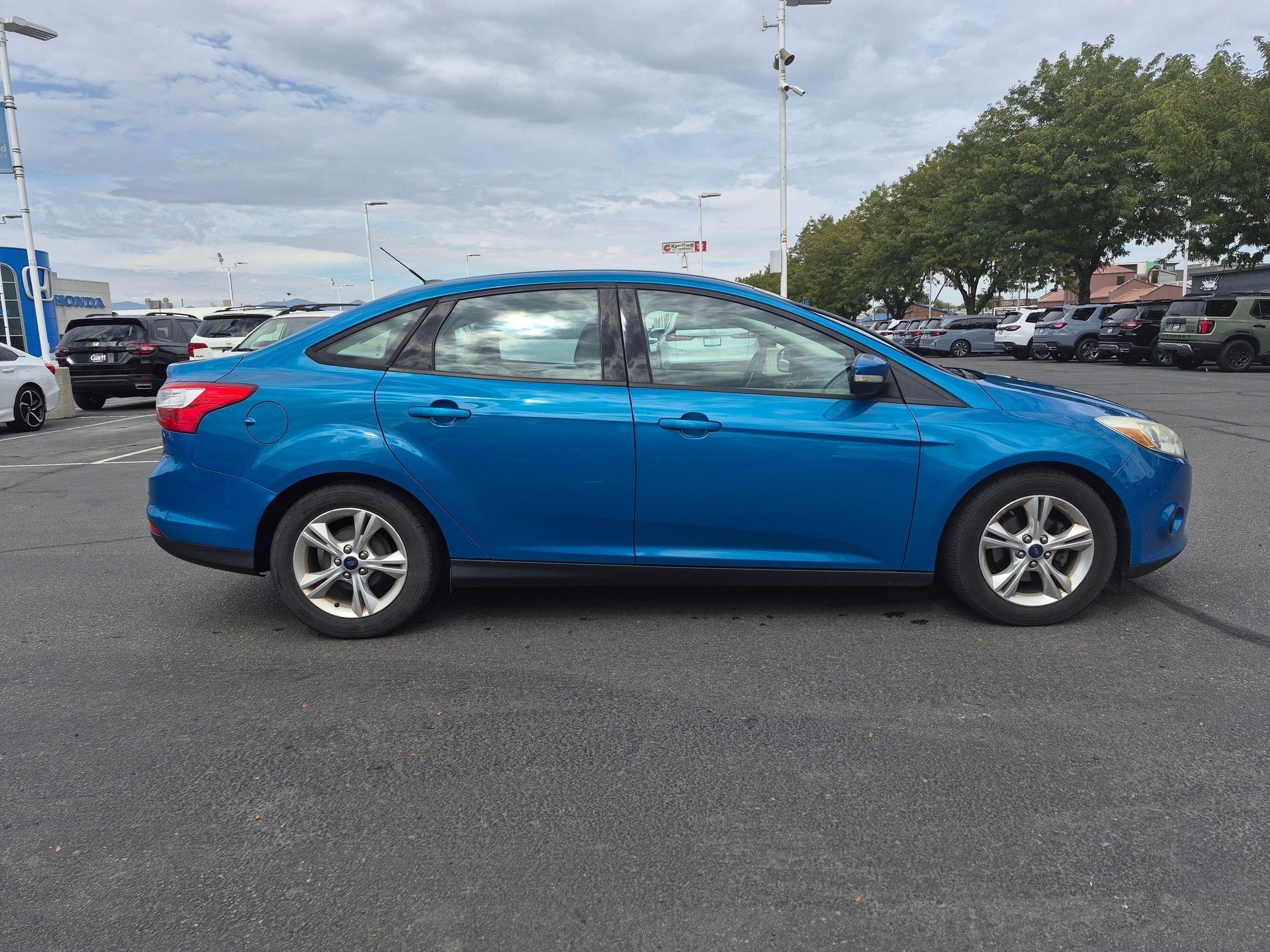 Used 2014 Ford Focus SE with VIN 1FADP3F28EL128893 for sale in Salt Lake City, UT