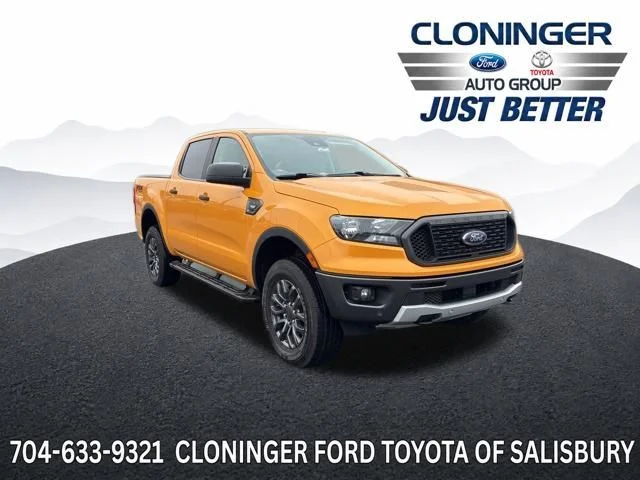 Used 2021 Orange Ford XLT image 1