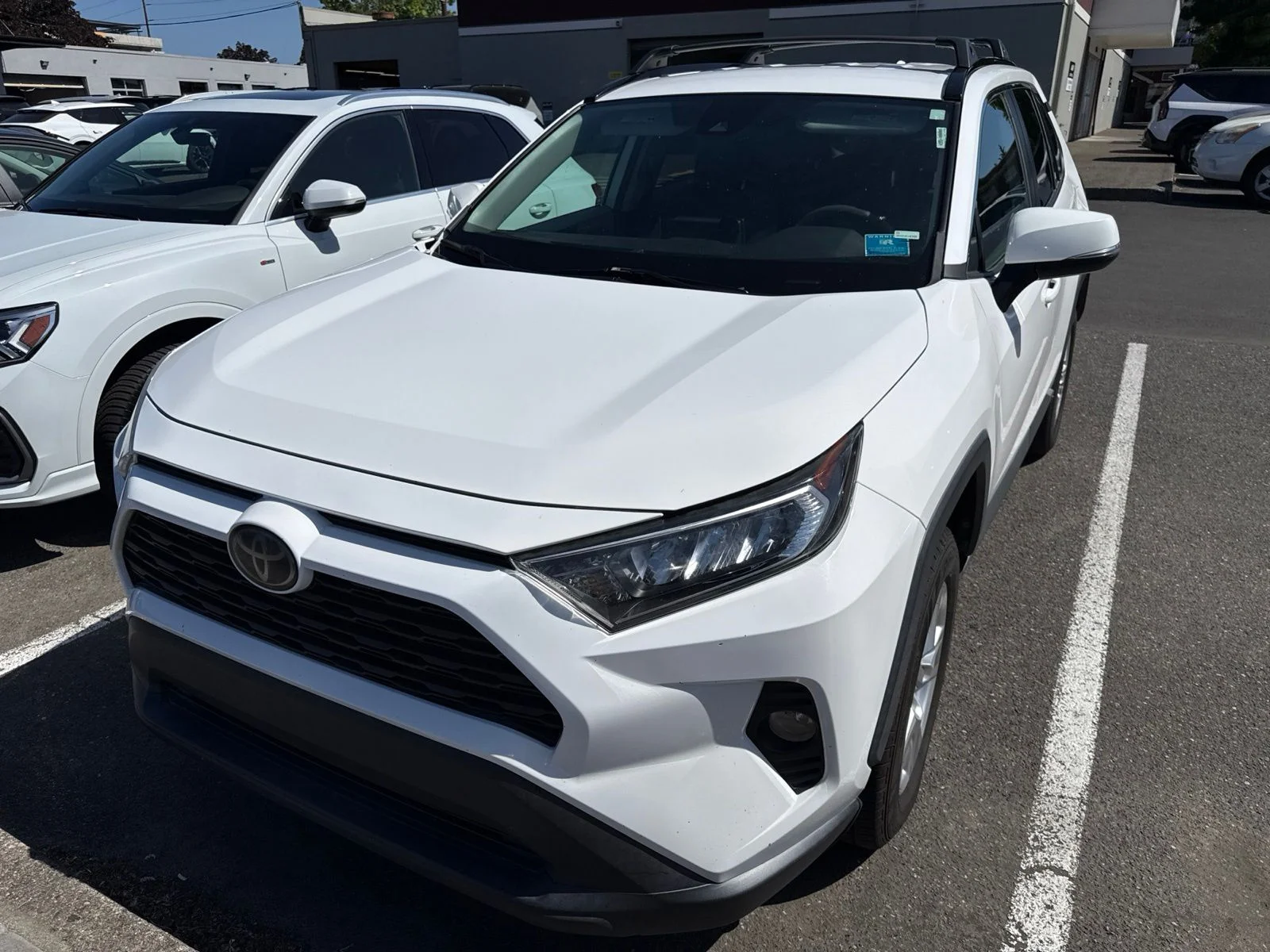 Used 2020 Super White Toyota XLE image 1