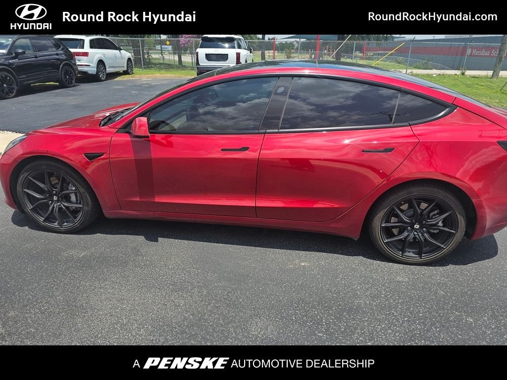 Used 2023 Red Tesla Base image 1