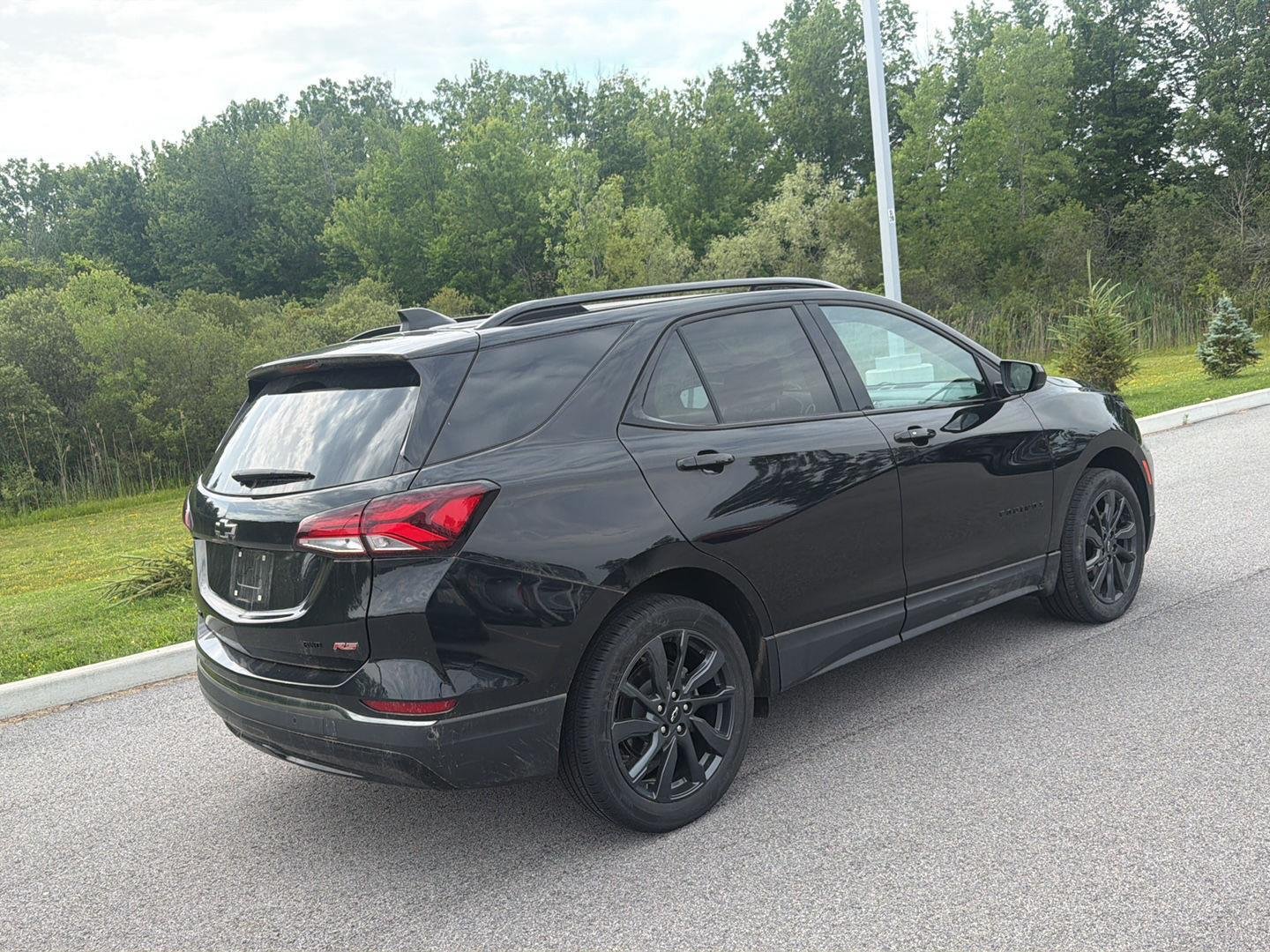 Used 2023 Mosaic Black Metallic Chevrolet RS image 4