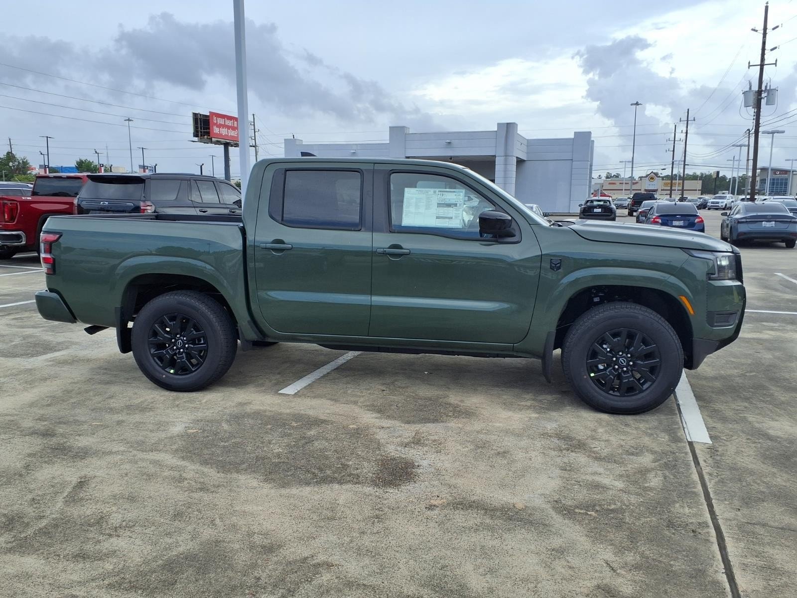 2026 Nissan Frontier SV Green at Robbins Nissan