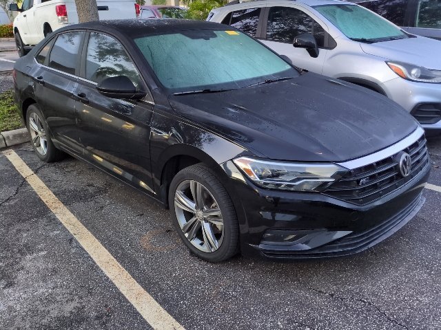 Used 2019 Deep Black Volkswagen R-Line image 1