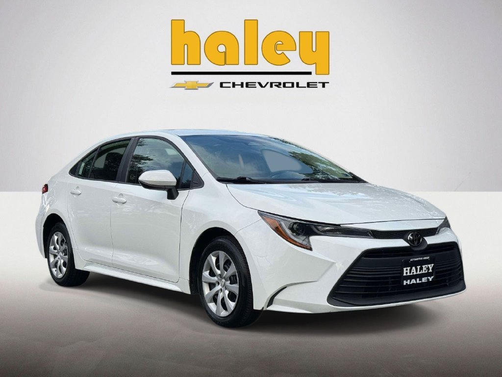 Used 2025 White Toyota LE image 1