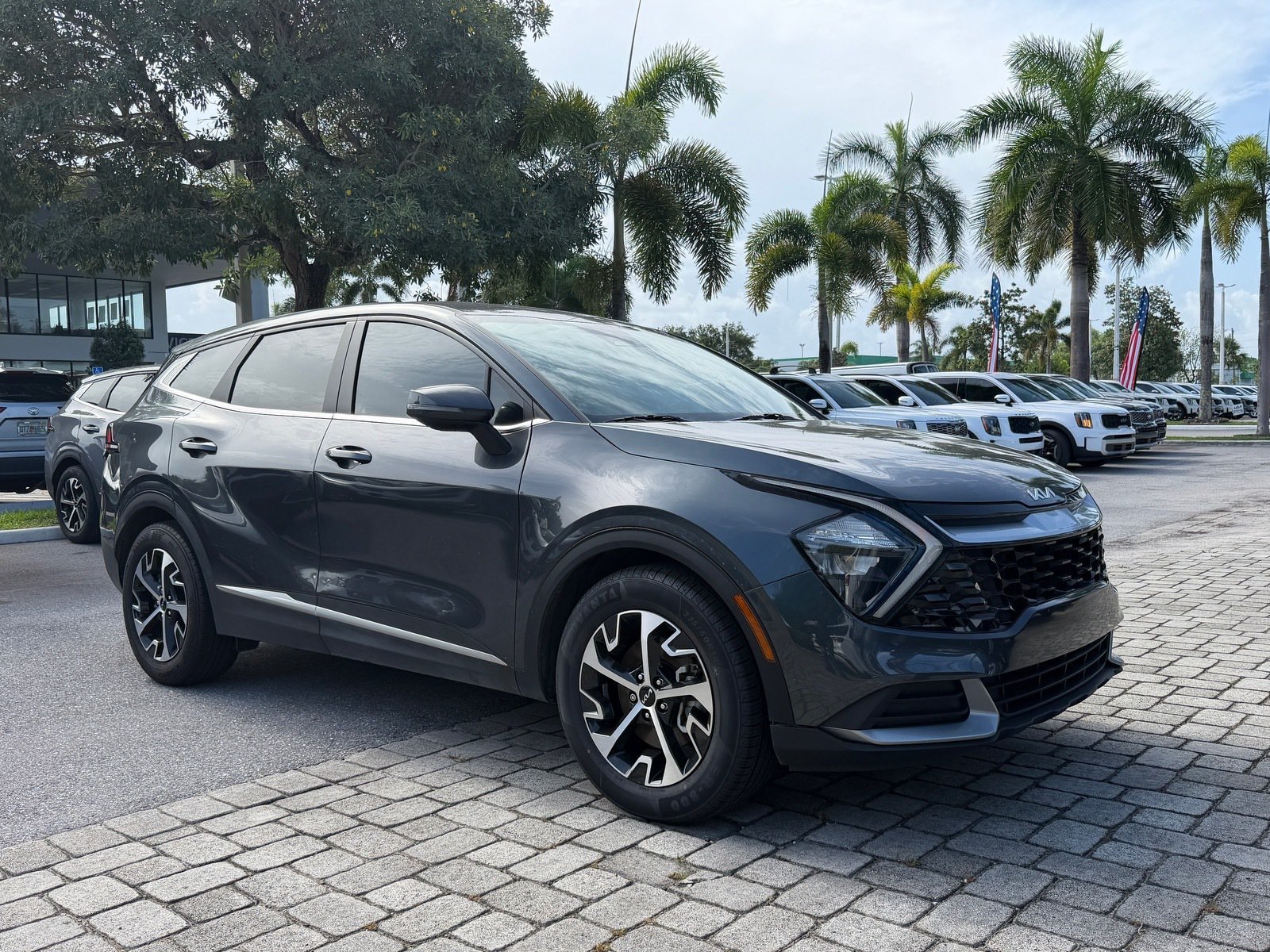 Used 2023 Gravity Gray Kia EX image 1
