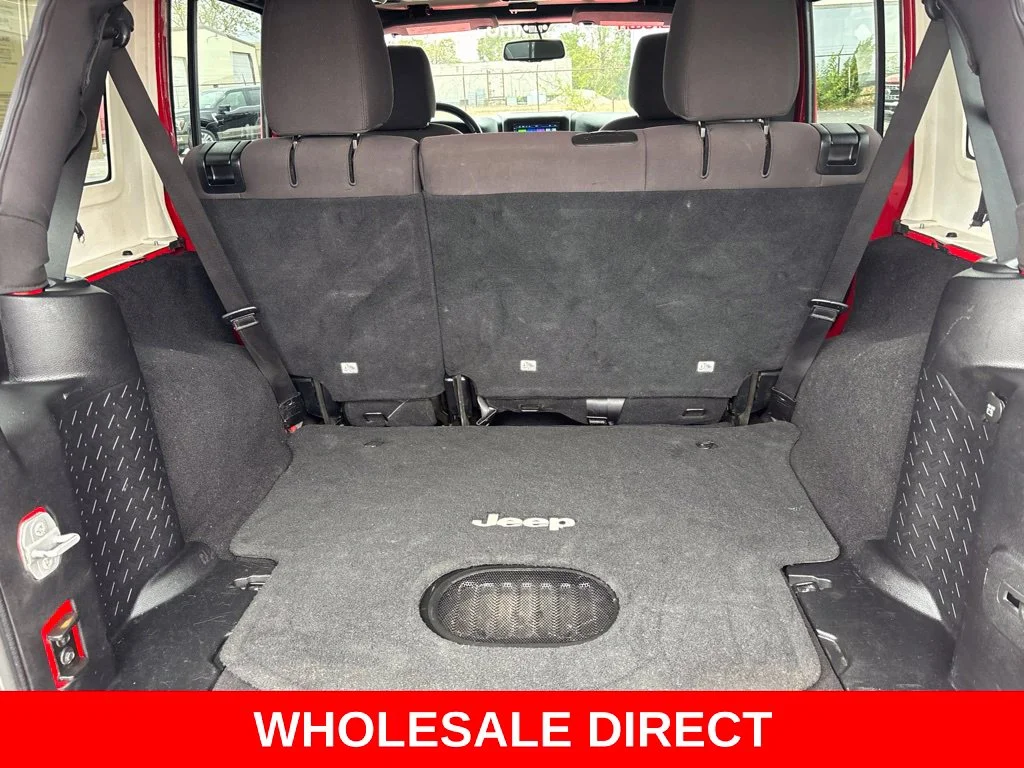 Used 2015 Red Jeep Unlimited Sport image 24