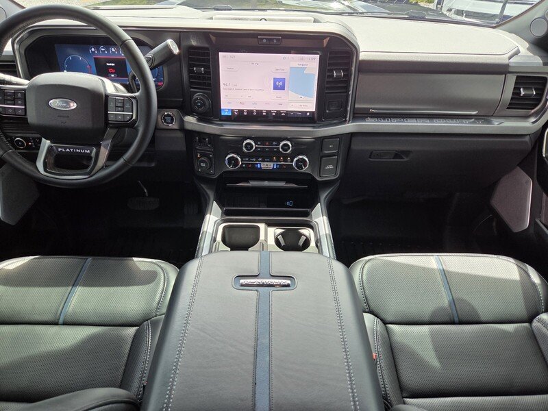 Used 2025 Blue Metallic FORD PLATINUM 4WD CREW CAB 6.75