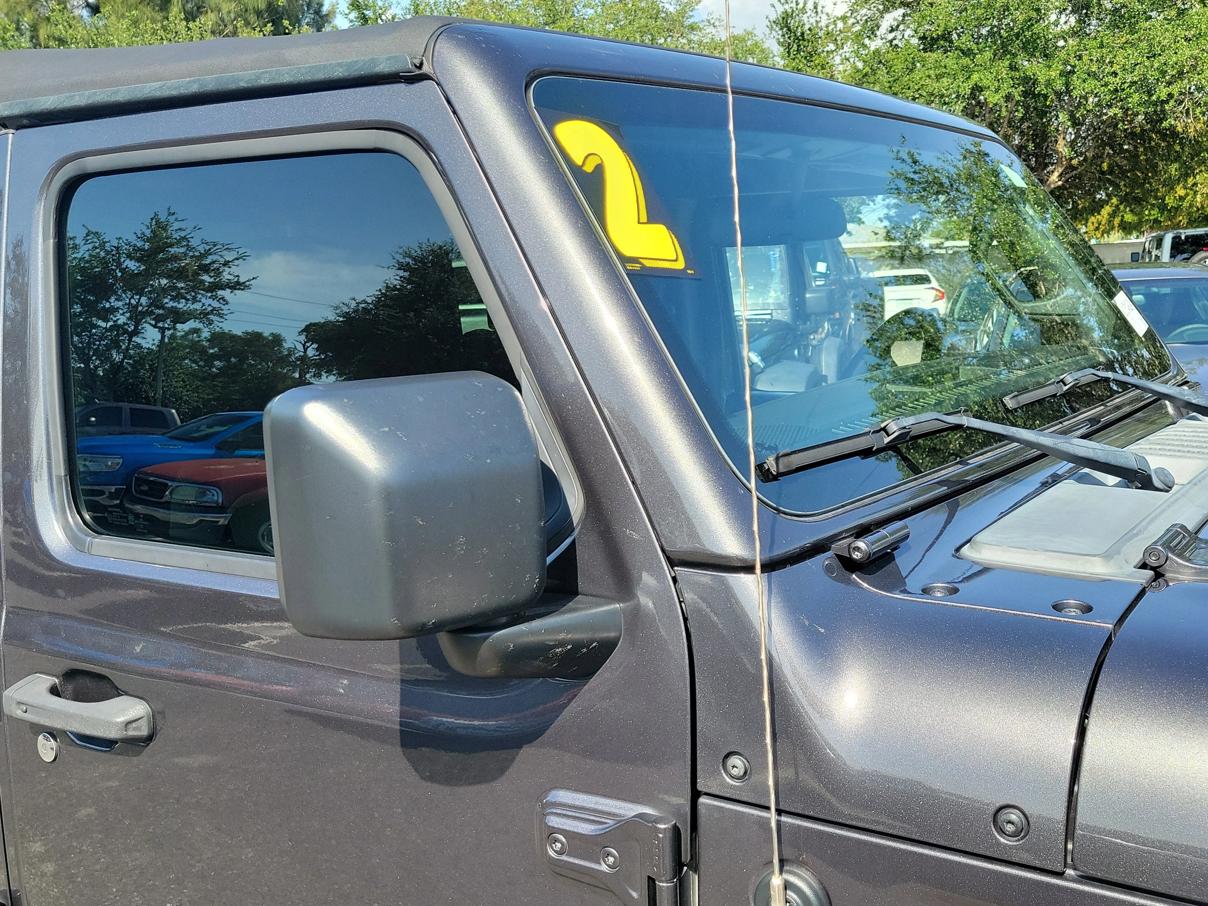 Used 2022 Granite Crystal Metallic Clearcoat Jeep Sport S image 9