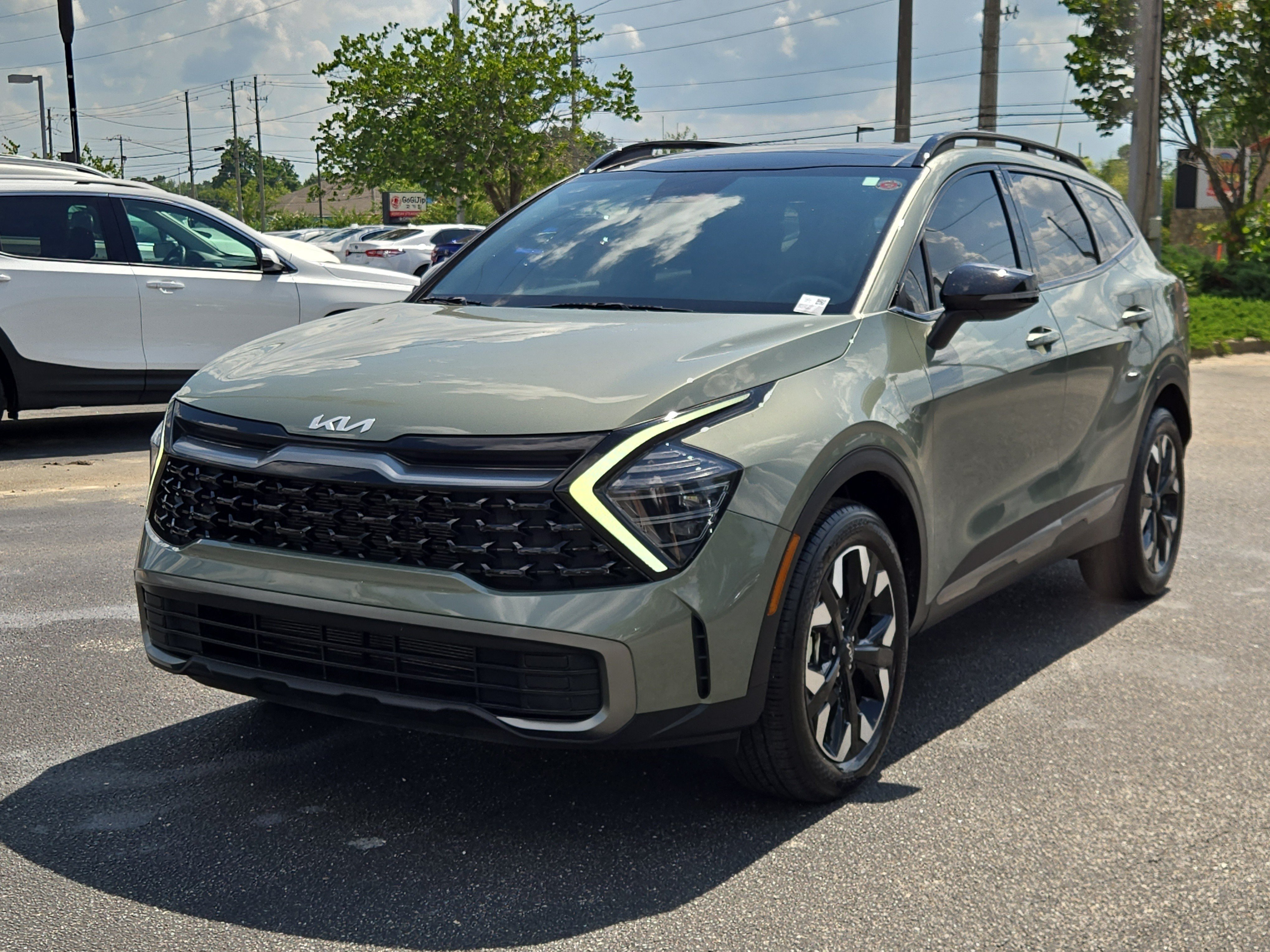 Used 2024 Jungle Green Kia X-Line image 1
