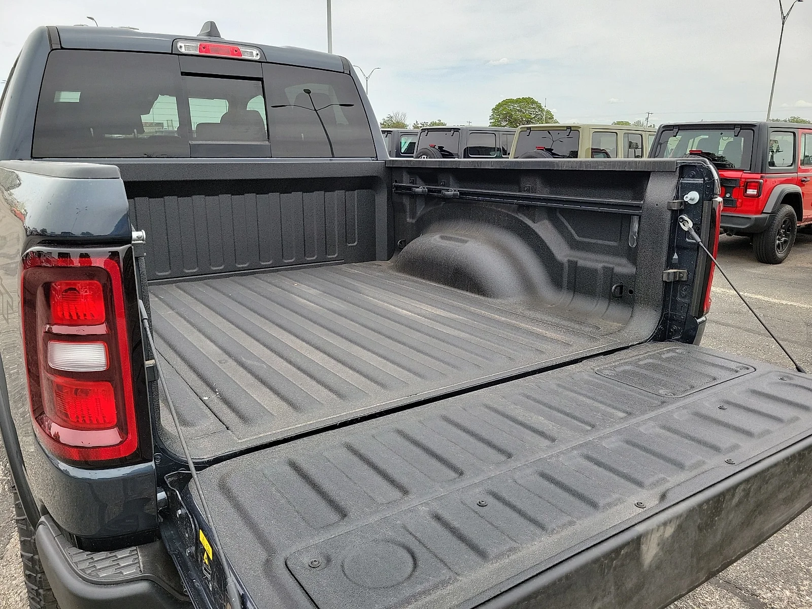 New 2026 Forged Blue Ram REBEL CREW CAB 4X4 5
