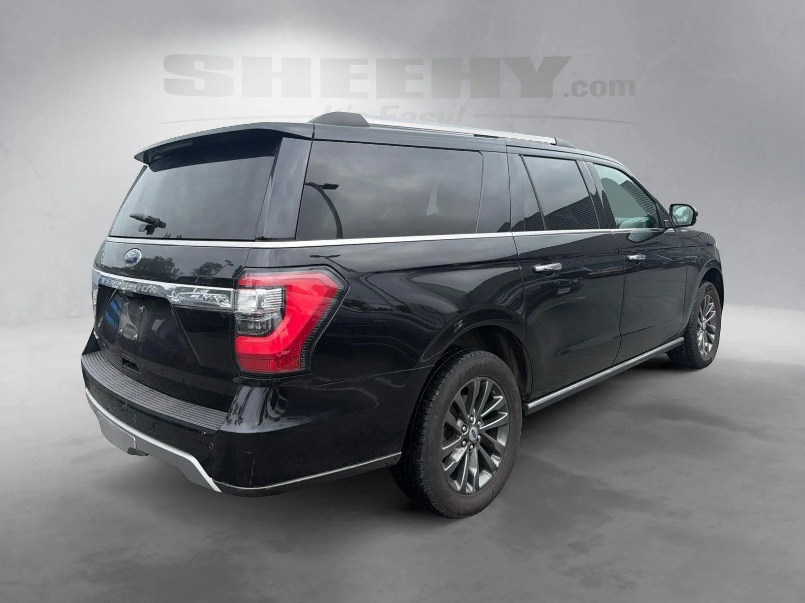 Used 2021 Agate Black Metallic Ford Limited image 12