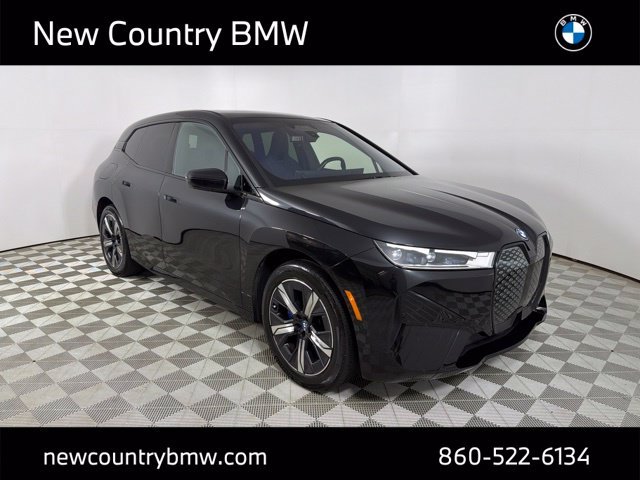 Used 2023 Black BMW xDrive50 image 1