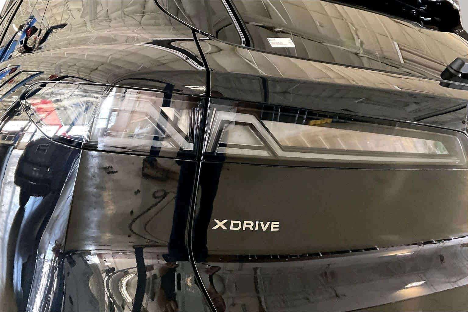 New 2027 Black Sapphire Metallic BMW 40 xDrive image 14