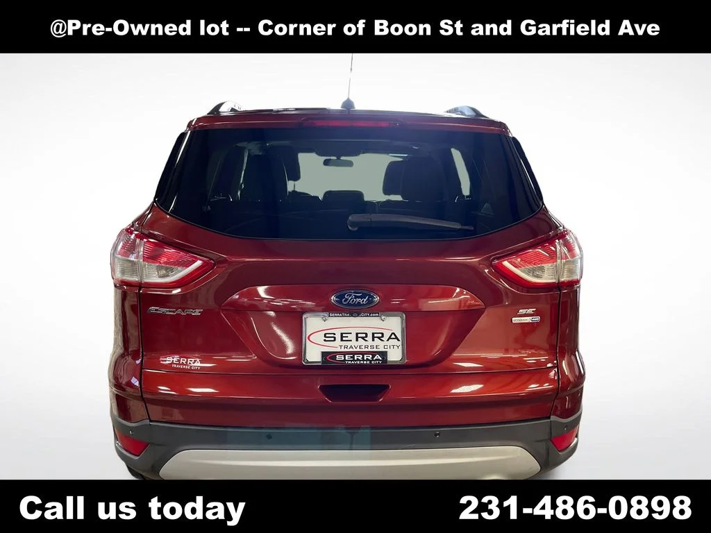 Used 2014 Orange Ford SE image 4