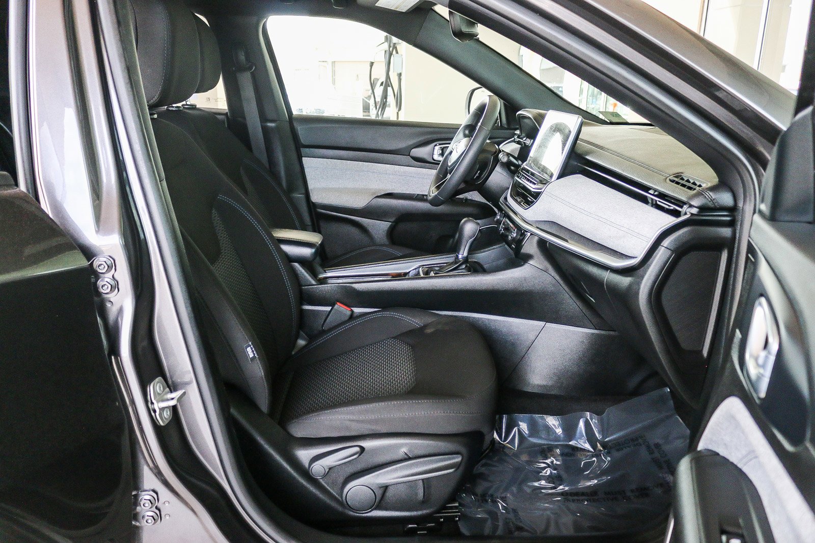 Used 2023 Granite Crystal Metallic Clearcoat Jeep Sport image 16