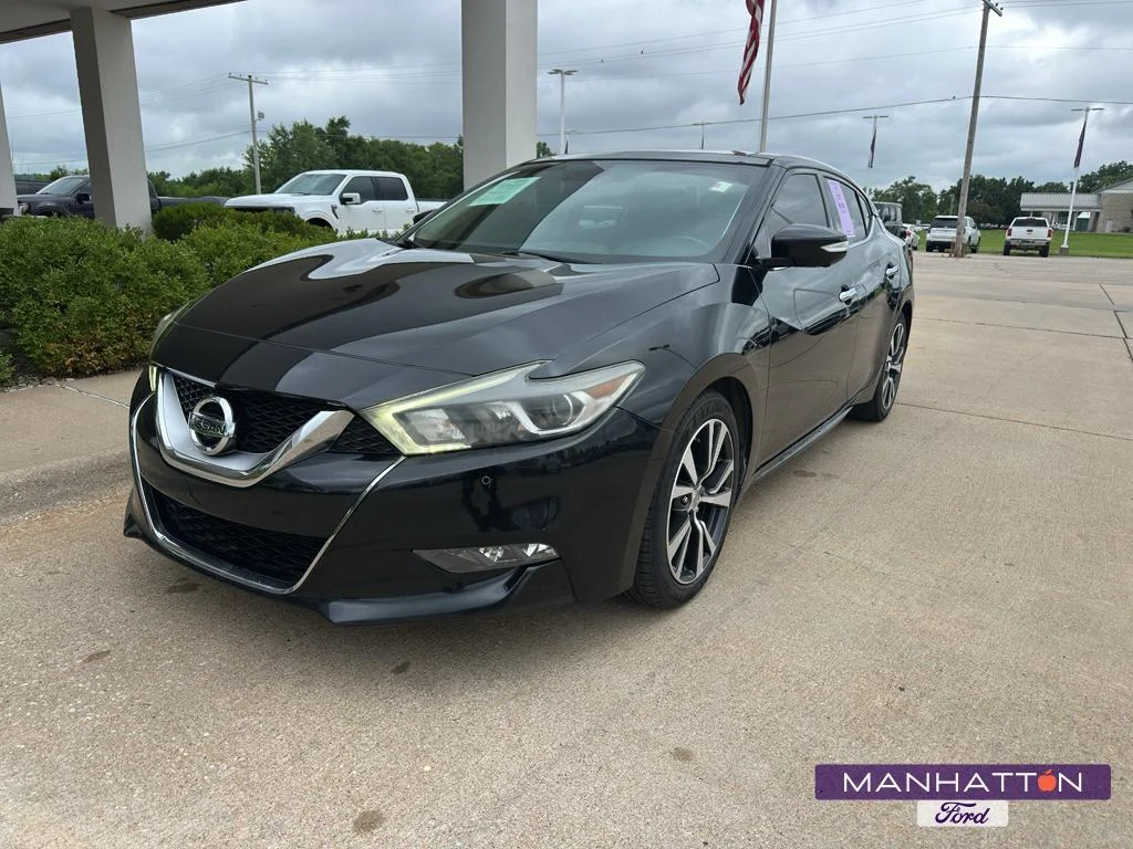 Used 2017 Super Black Nissan Platinum image 1